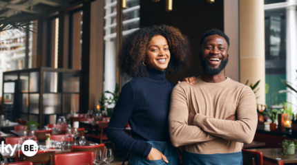 man and woman smiling